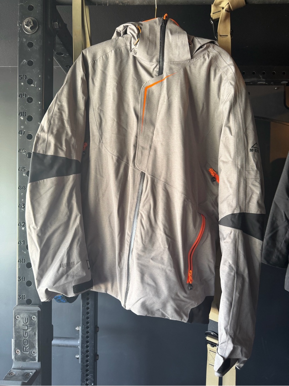 Light Gray Men's Ski Jacket with Orange Accents